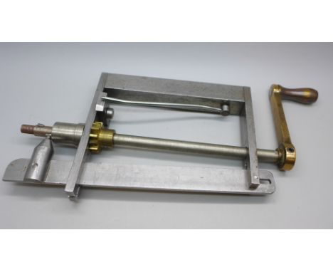 A clock mainspring winding tool 