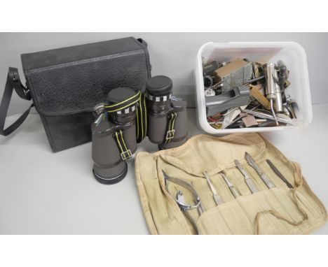Assorted watchmakers tools comprising of files, screwdrivers, scalpel set, and more, together with a pair of binoculars