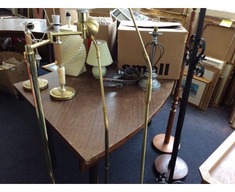 A lot to include assorted glass lamp shades and light fittings, six standard lamps, other lamps etc. 