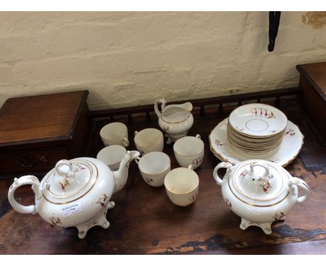 A white tea set with red and gilded pattern with variou other ceramic ware including Davenport.