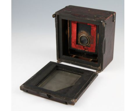 A Junior Sanderson brass and mahogany ¼ plate camera fitted with Koylos shutter and lens