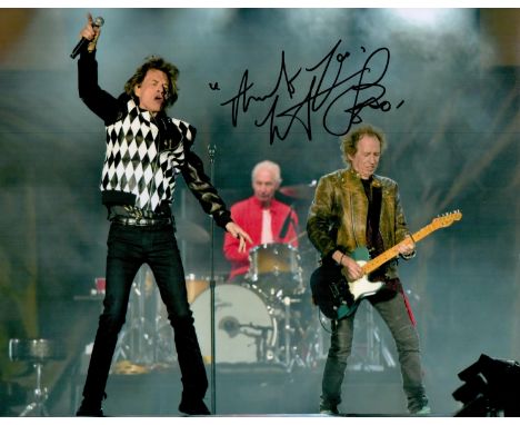 Rolling Stones, Charlie Watts signed 10x8 colour photograph picturing Watts on stage drumming in action with the Rolling Ston