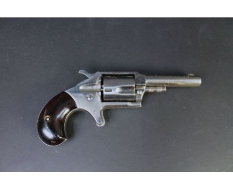 An Imperial 2 Rimfire revolver, the silver coloured action with 2 1/2" cylindrical barrel, five shot cylinder and wooden grip