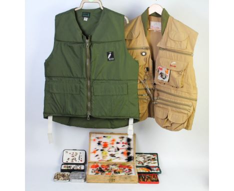 An England's fly fishing vest Size M and a Heron life jacket and five fly boxes containing trout and salmon flies.