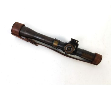 A World War II sniper scope for the Lee Enfield rifle, marked to the tube Tell Sighting No. 32 Mk 1, OS. 4?.KL 1941 Registere