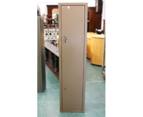 A six gun cabinet, with internal shelf and keys.  Height 150 cm, width 35.5 cm, depth 26 cm.