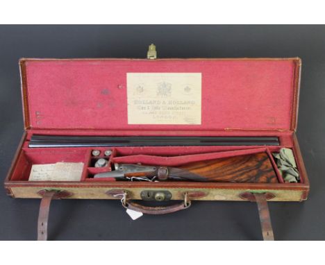 A Holland & Holland Dominion 12 bore side by side shotgun, with 29" barrels, cylinder and improved choke, 65 mm chambers, the