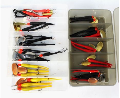 An Abu Garcia tackle box, containing Flying C lures together with another containing Flying C's.