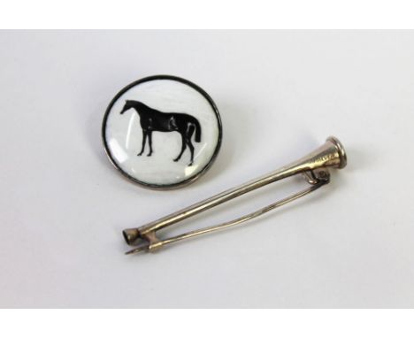 A stock pin in the form of a hunting horn, marked 925 silver together with a brooch with enamel or ceramic horse motif to fro