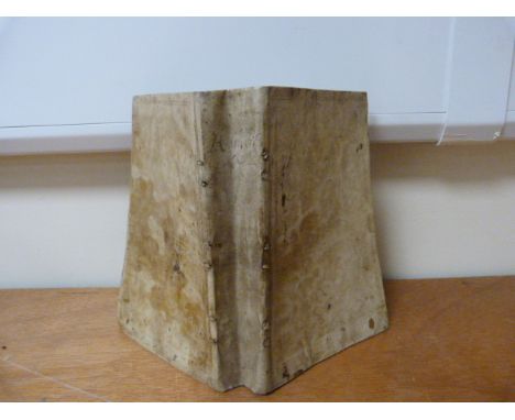 MANUSCRIPT BOOK. A thick 8vo vol. in limp vellum with many blank leaves interspersed with manuscript entries in a readable ha