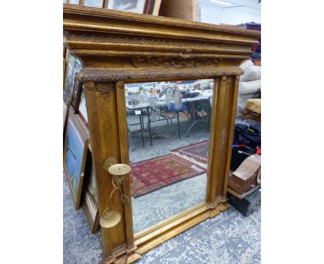 A LARGE GILT OVER MANTLE MIRROR. 