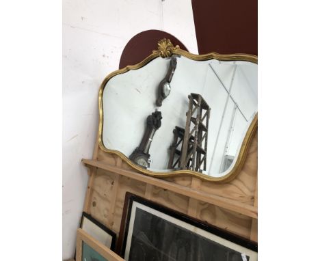 A DECORATIVE GILT BEVELLED EDGE MIRROR, H 82cms, W 118cms