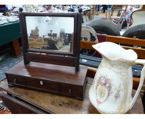A GEORGIAN SWING MIRROR AND A WASH JUG. 