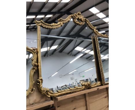 AN IMPRESSIVE GILT FRAMED OVER MANTLE MIRROR, H 118, W 128cms
