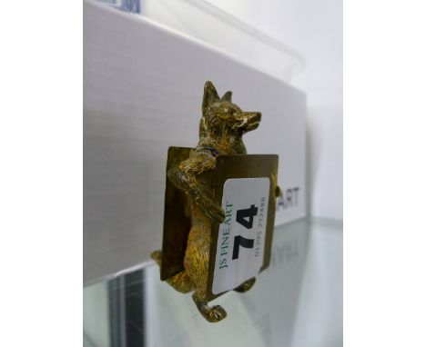 A COLD CAST BRONZE FOX HOLDING A PLACARD, A CHAMPAGNE TAP, TAPE MEASURES ETC.  