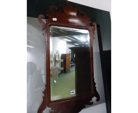 AN ANTIQUE FRET FRAMED WALL MIRROR AND ONE OTHER SIMILAR MIRROR. 
