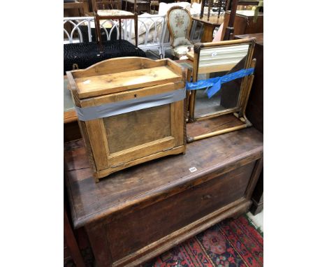 A CANE FRAMED DRESSING TABLE MIRROR TOGETHER WITH A PINE WALL CUPBOARD WITH PULL DOWN DOOR