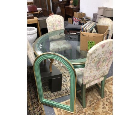A GLASS TOPPED GREEN PAINTED DINING TABLE. Dia. 128 x H 76cms. FOUR CHAIRS AND A ROUND ARCH MIRROR EN SUITE MADE IN SPAIN BY 
