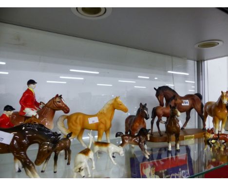A COLLECTION OF BESWICK HORSES TOGETHER WITH OTHERS AND HUNTING FIGURES MARKED FOREIGN