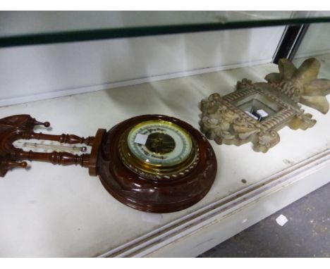 A MAHOGANY BANJO CASED ANEROID BAROMETER TOGETHER WITH A GILT FRAMED MIRROR