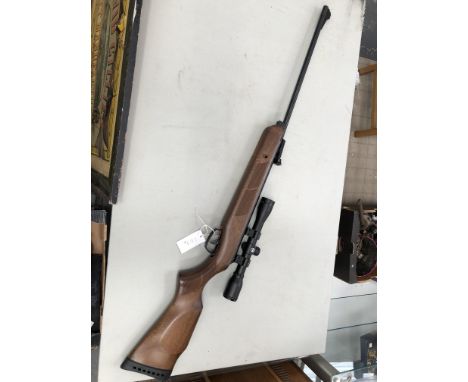 A BSA .22 CALIBRE AIR RIFLE WITH HAWKE 4 X 32 SIGHT AND A BOX OF SOME SUPERPOINT AMMUNITION