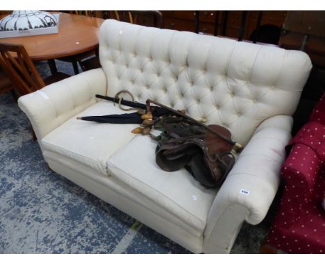 A SMALL BUTTON BACK DROP END SETTEE. 