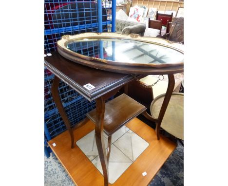 A MAHOGANY OCCASIONAL TABLE AND AN OVAL MIRROR. 