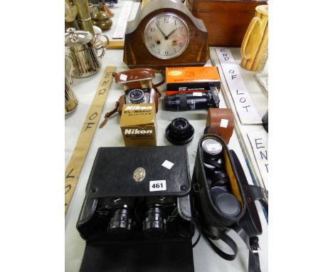 TWO PAIRS OF BINOCULARS, CAMERA LENSES AND A MANTLE CLOCK. 