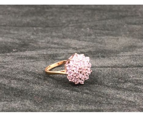 A 9ct HALLMARKED GOLD CZ MULTI CLUSTER RING. FINGER SIZE K. WEIGHT 2.5grms. 