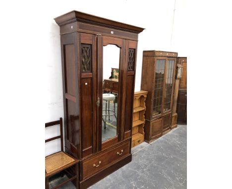 A CHEQUER LINE INLAID MAHOGANY MIRROR DOOR WARDROBE.   W 104 x D 46.5 x H 200cms. TOGETHER WITH A PAIR OF CANE SEATED CHAIRS 