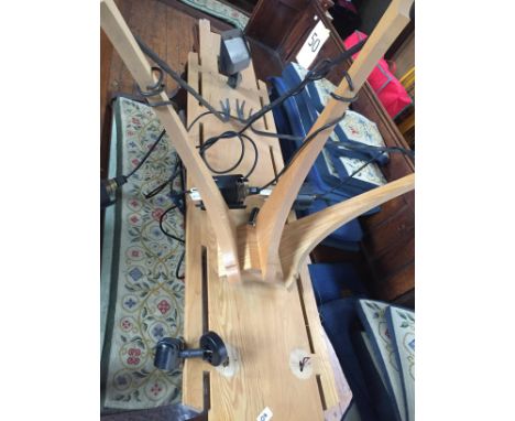 Three wooden frames with lighting attachments. CONDITION REPORT: All lots in this sale are part of the refurbishment of Newca