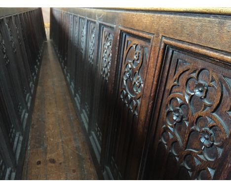A carved oak panel, length 568 cm, height 86 cm. CONDITION REPORT: All lots in this sale are part of the refurbishment of New