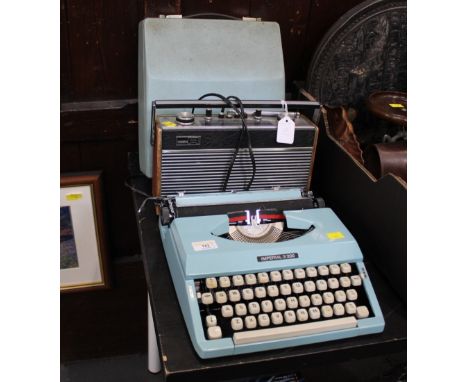 Imperial 200 pale blue typewriter and Roberts radio 