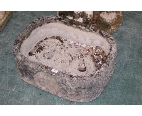 Shallow concrete garden planter, textured design 