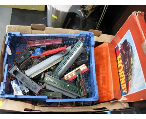 Box of Hornby 0 gauge track and engine and box of Hornby 00 carriages  