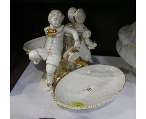 Royal Worcester table centre, children climbing a tree branch