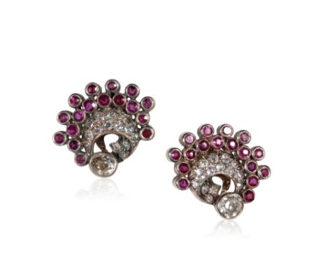 PAIR OF DIAMOND AND RUBY EAR CLIPS, a single cushion-cut diamond, approx .25ct, collet-set beneath a double curved row of pav