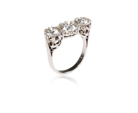THREE STONE DIAMOND RING, the centre brilliant-cut diamond approx 2ct, flanked by two further diamonds each approx 1.25ct, cl