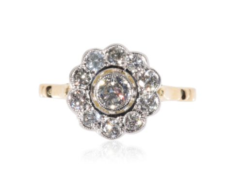 DIAMOND CLUSTER RING, the centre halo-set diamond, surrounded by a border of ten rub-over set diamonds, approx 0.65ct total, 