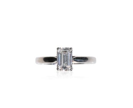 DIAMOND SOLITAIRE RING, the emerald-cut diamond approx .75ct claw-set, on a white gold shank with open work shoulders, ring s