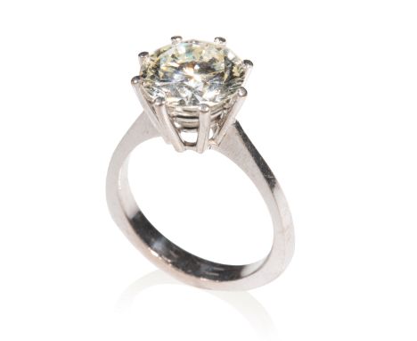 DIAMOND SOLITAIRE RING, the brilliant-cut diamond approx 3.4ct, raised claw-set on a white gold shaped shank, ring size L-M