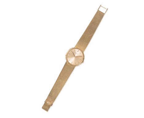 PATEK PHILIPPE 18CT GOLD CALATRAVA GENTLEMAN'S BRACELET WATCH with manual wind movement, the champagne-coloured dial with gol
