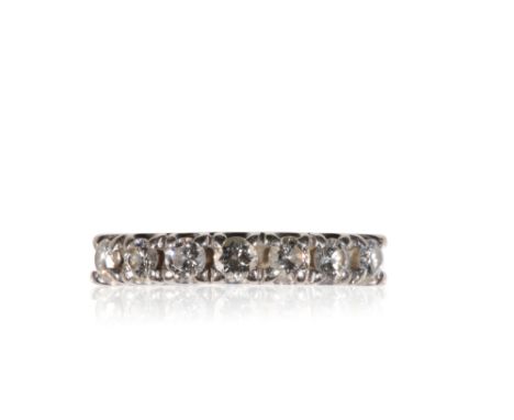 SEVEN STONE DIAMOND RING, approx .55ct total weight, claw set on an 18ct white gold shank, ring size K-L