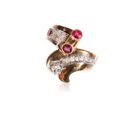 DIAMOND AND RUBY DRESS RING, the round-cut diamond approx .33ct, attached to a curved row of pave-set diamonds, on a cross ov