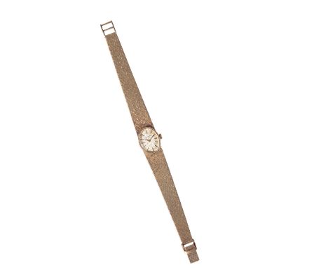 LONGINES 9CT GOLD LADIES BRACELET WATCH with manual wind movement, the gold dial with baton numerals and hands, circa 1950's,