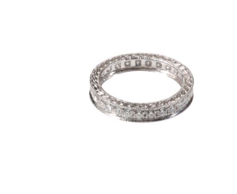 DIAMOND FULL ETERNITY RING, rub-over set on an 18K white gold band, ring size K