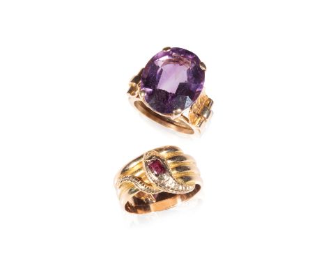 AMETHYST DRESS RING, the oval-cut amethyst, claw set on an unmarked yellow metal shank with shell shaped shoulders, ring size