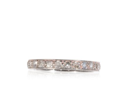 DIAMOND ETERNITY RING, set in unmarked white metal, ring size N