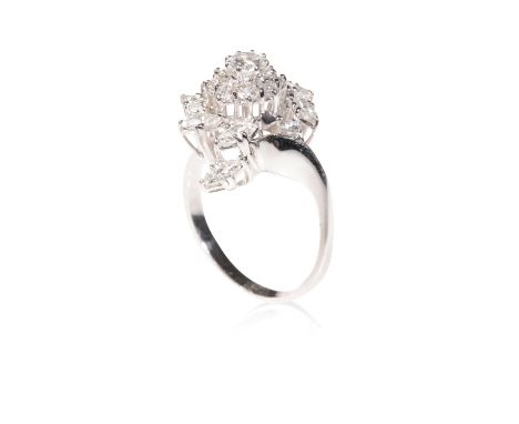 DIAMOND CLUSTER RING, the centre diamond approx .33ct, surrounded by a border of eight claw-set diamonds, forming a flower he