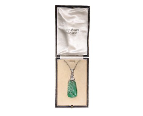 JADE AND DIAMOND PENDENT NECKLACE, the carved and pierced jade, 4.2 cms long, with a diamond set suspension, the largest diam